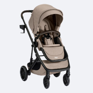 Britax B-Free stroller being pushed on a trail, showing smooth suspension and all-wheel design